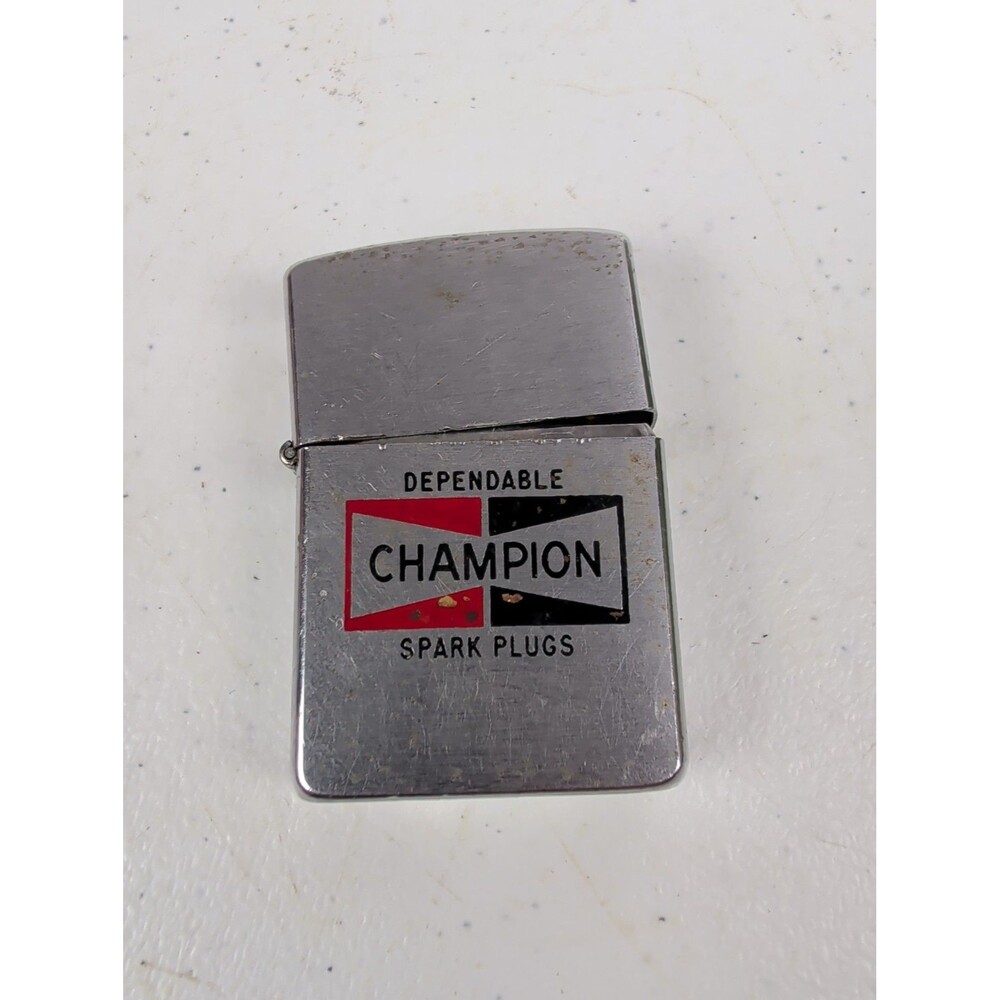 VINTAGE USED "CHAMPOIN SPARK PLUGS" ZIPPO LIGHTER 50-57 NICE COLOR